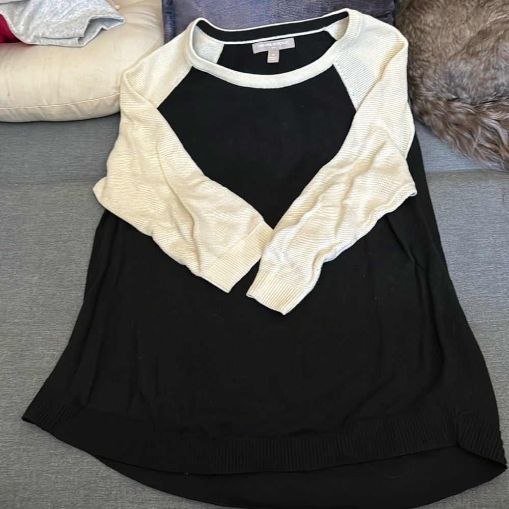 Black sweater with white sleeves